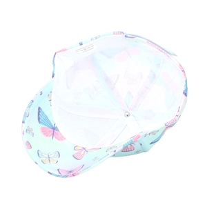 Detailed view of the breathable mesh lining and 100% polyester label on a kids baseball cap