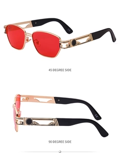 Detail of steampunk sunglasses featuring gold engraved temples and red lenses