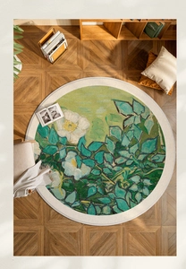 Detail of round oil painting carpet showing green floral patterns and durable edge stitching