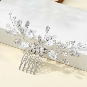 Silver leaf hair comb with white pearls and sparkling crystals for bridal hair styling