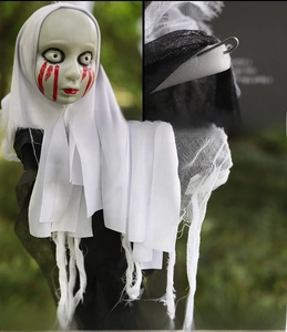 Detailed views of Halloween ghost decor showing skull face, wire frame and mesh fabric
