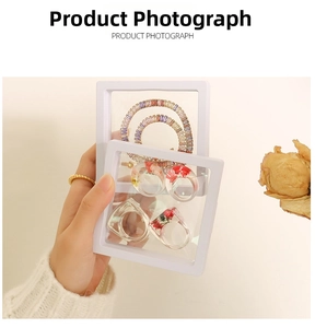 Handheld view of a clear PE film suspension display box for rings and bracelets