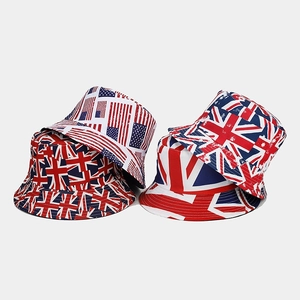 Detail view of stacked bucket hats with US and UK flag prints in red, white and blue