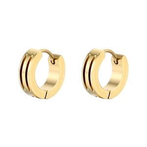 Close-up of golden stainless steel hoop earrings with three parallel industrial grooves