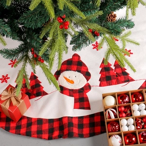 Classic red and black buffalo plaid Christmas tree skirt with snowman and tree appliques