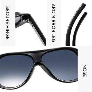Detail view of secure hinges, arc mirror legs and nose pads on black sunglasses