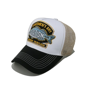 Detail of fish embroidery and mesh back on a vintage three-color trucker sun hat