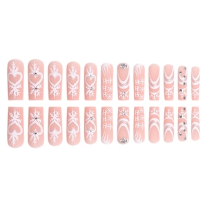 Set of 24 pink snowflake press-on nails with silver glitter, hearts and rhinestones