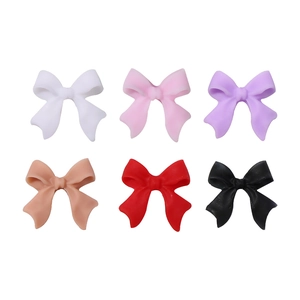 Set of 6 matte resin bow nail art charms in white pink purple beige red and black colors