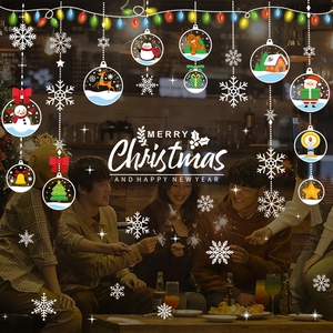 Christmas window stickers with Santa, reindeer and snowflakes for festive glass decoration