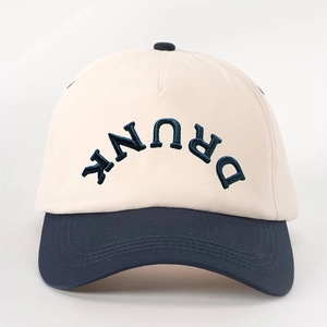 Retro contrast baseball cap in beige and navy with DRUNK embroidery on a white background