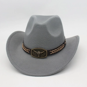 Detail of grey felt cowboy hat with bronze bull head buckle on a brown braided band