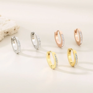 Three-pair set of minimalist stainless steel hoop earrings in gold, silver, and rose gold