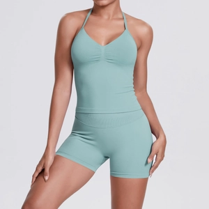 Detail of mint green seamless yoga set with halter neck top and high waist shorts