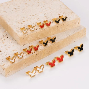 Gold stainless steel butterfly earrings with colorful shell inlay on stone pedestals