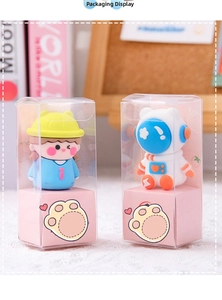 Detailed packaging view showing cartoon astronaut and girl characters in pink boxes