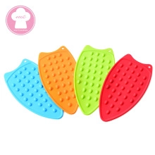 Set of four colorful silicone iron rest pads with non-slip heat resistant raised dots