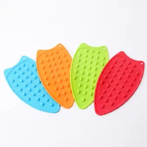 Set of four colorful silicone iron rest pads with non-slip heat resistant raised dots