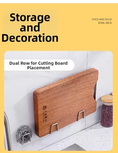 Detail of thickened stainless steel kitchen rack holding a cutting board on a tile wall