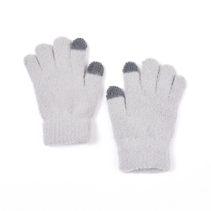 Detailed close-up of warm knitted gloves with touchscreen-compatible fingertips and ribbed cuffs