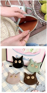 Close-up of four colors of cat-shaped PU leather coin purses with an open view detail