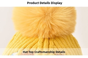 Detail of yellow knit baby hat featuring a soft faux fur pom-pom and thick ribbed texture