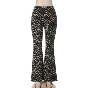 Detailed view of high-waisted leopard print flare trousers with a zebra pattern texture