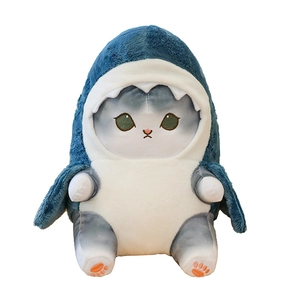 Creative plush cat toy wearing a blue shark costume, soft stuffed animal for home decor