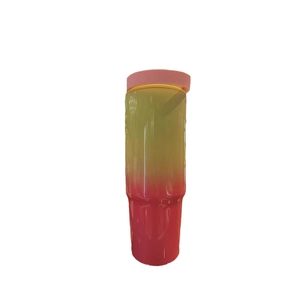 30oz pink and yellow gradient insulated travel tumbler with straw and lid on white background
