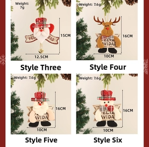 Detail of fabric Christmas ornaments with Santa, Reindeer and Feliz Navidad signs