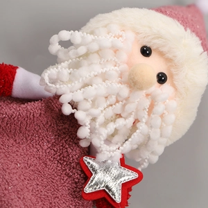 Poupée Père Noël en peluche rose et blanc avec étoile argentée et tissu tricoté