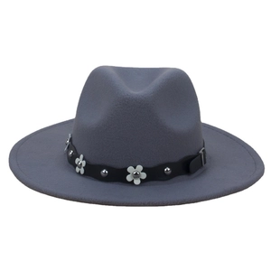 Dark grey wool felt fedora hat featuring a floral rivet band on a white background