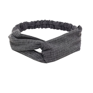 Dark grey knitted twist knot headband with ribbed texture for yoga and daily wear