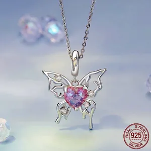 Elegant s925 sterling silver butterfly necklace with pink heart stone on dreamlike background