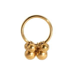 Detail of a vintage golden ring featuring six metallic spheres dangling from the band