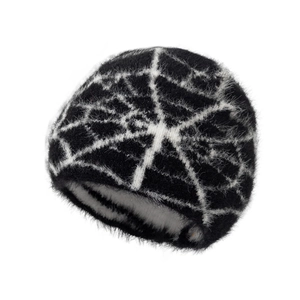 Winter spider web knit beanie with fuzzy fleece lining and black-white pattern design