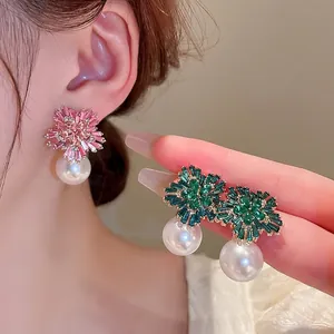 Elegant floral rhinestone stud earrings with pearl pendants in pink and green colors