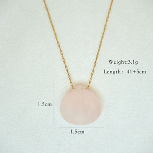 Detail view of pink gemstone pendant with dimensions 1.5cm and chain length 41+5cm