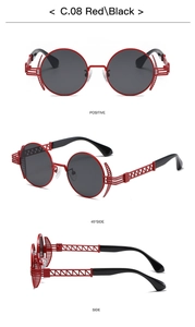 Punk style round sunglasses in red and black with hollow metal temples and resin lenses