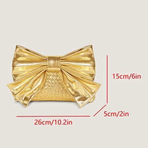 Detailed size guide of gold bow evening clutch showing dimensions in cm and inches