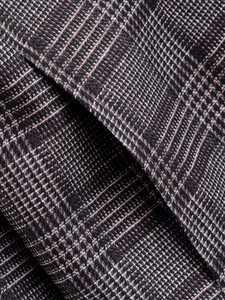 Macro shot of high-quality brown plaid wool-blend fabric for casual blazer jacket