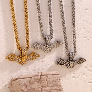 Détails des pendentifs chauve-souris hip-hop en or, argent et gris anthracite sertis