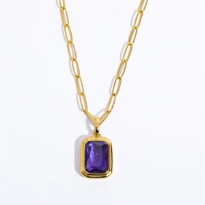 Detail of 18K gold plated paperclip chain with a rectangular purple zircon pendant