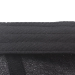 Detailed close-up of durable cotton sweatband stitching on a black newsboy flat cap