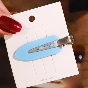 Detail of 6CM light blue acetate hair clip with silver metal duckbill clamp base