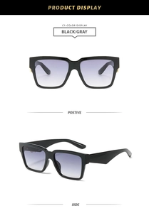 Front and side views of oversized square sunglasses with black frames and gradient lenses