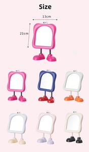 Cartoon tabletop makeup mirror with large eye accents and shoe-shaped base in six colors