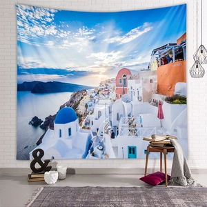 Detail of Santorini landscape tapestry showing blue dome churches on a white brick wall