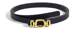 Detail of slim black leather belt featuring a polished gold metal circular buckle
