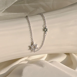Exquisite silver star bracelet with sparkling zircon and hollow star elements for women